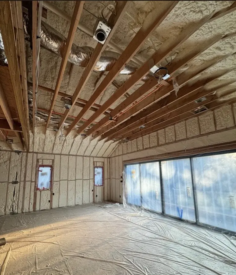 Interior walls and ceiling insulated with spray foam during new construction in Norristown